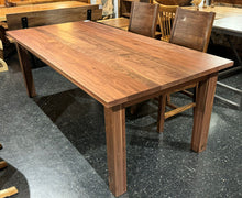 Rectangular walnut dining table with four corner legs