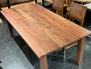 Rectangular walnut dining table with four corner legs