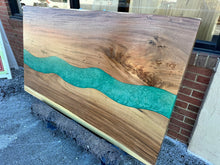 Live edge acacia wood with epoxy river