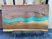 Live edge acacia wood with epoxy river