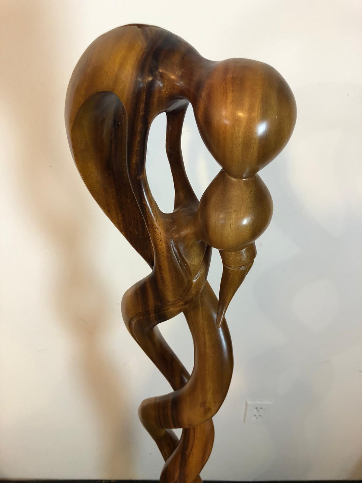 Kissing couple abstract wood sculpture
